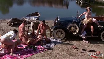 Amateur Swingers Engage In Wild Public Orgy