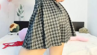 Young Redhead Undresses And Pleasures Herself