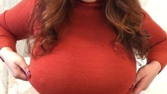 Brown-Haired Milf Shows Off Her Amazing Boobs