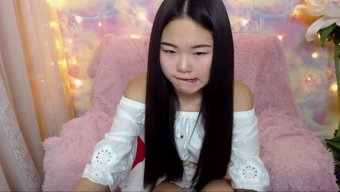 Japanese Girl Masturbates In Tight Clothing