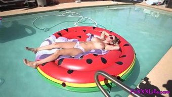 A Busty Blonde Experiences An Intimate Encounter On A Floating Dock, As Seen On Thefoxxxlife.