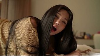 An Asian Girl Was Teasing Her Pussy On Cam And Got Fucked