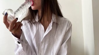 Close-Up Video Of A Chinese Girl Using A Dildo For Oral And Vaginal Pleasure
